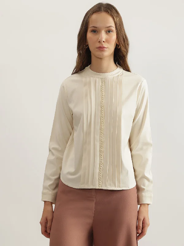 Women's Blouse with FlouncesIconic Women Cream Solid Round Neck Full Sleeves Top